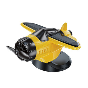 Solarbetriebenes Autoornament in Flugzeugform