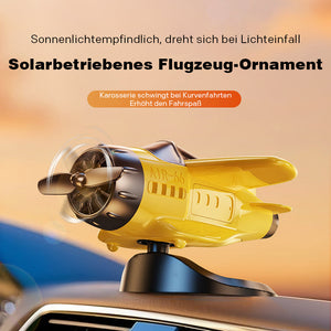 Solarbetriebenes Autoornament in Flugzeugform