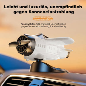 Solarbetriebenes Autoornament in Flugzeugform